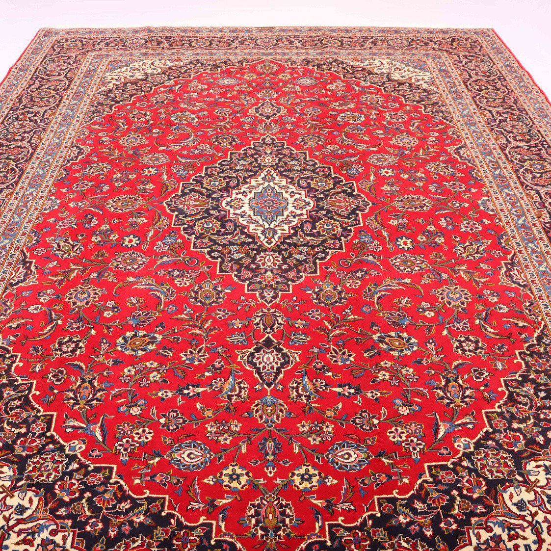 Close-up of a 3.5x2.6 meter Antique Persian Kashan Rug with intricate floral patterns and rich, warm tones